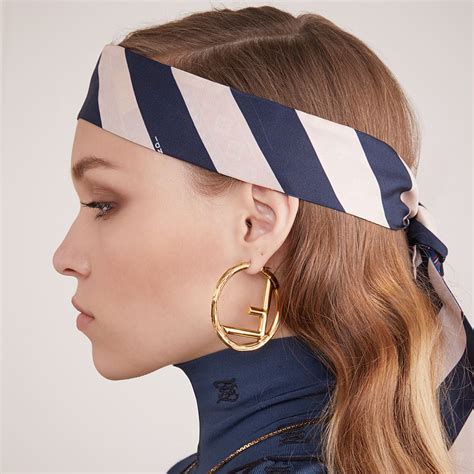 f is for fendi earrings.